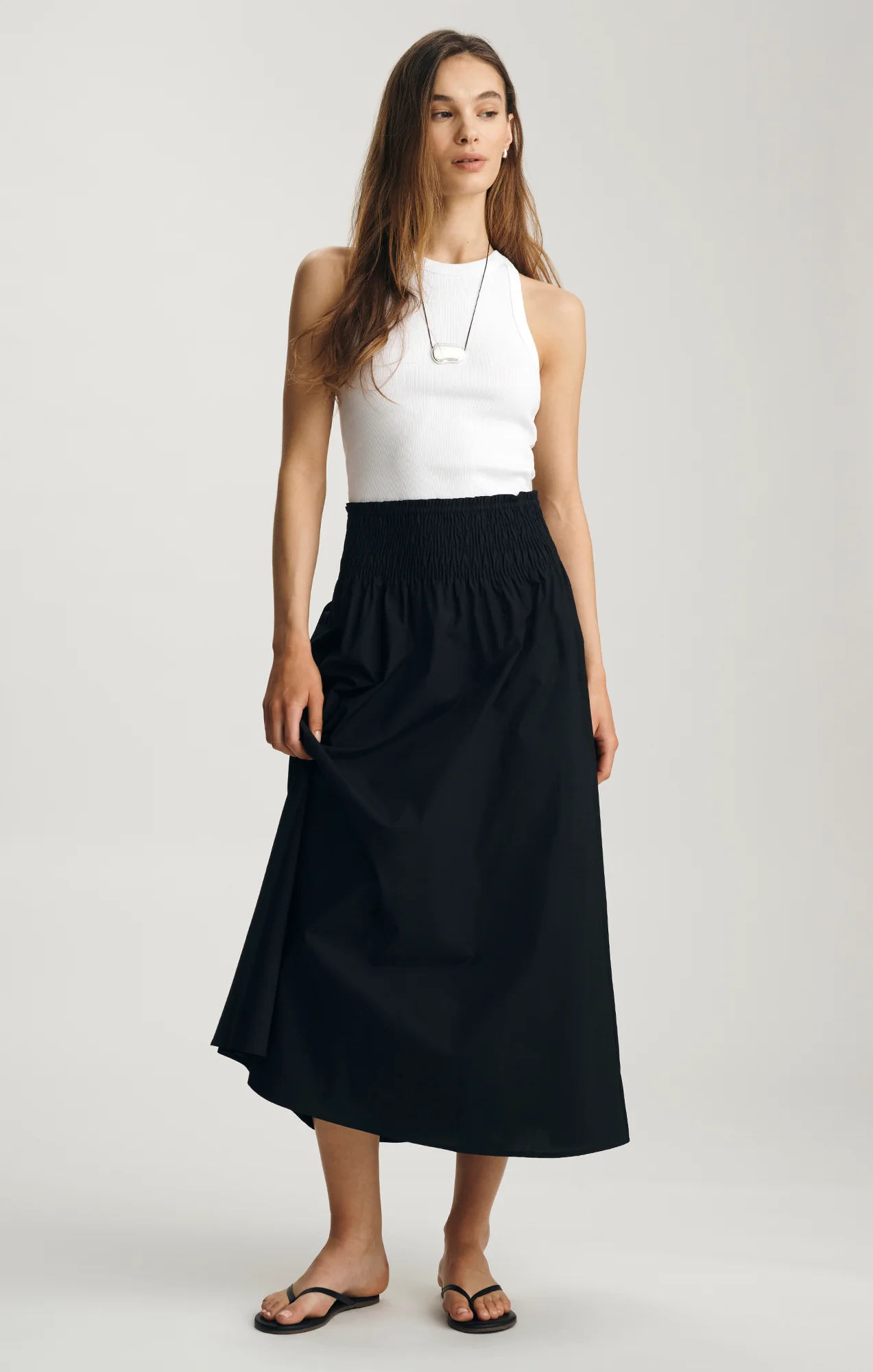 SMOCKED MAXI SKIRT IN BLACK